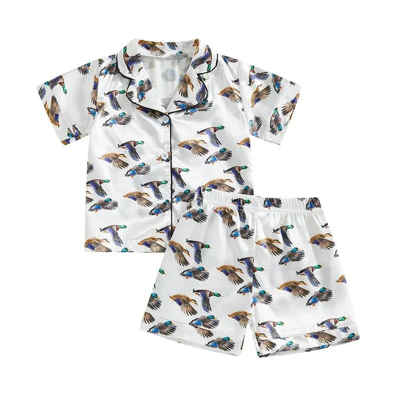 Unisex summer silk pajama set with tropical print and matching shorts for kids 6 months to 6 years