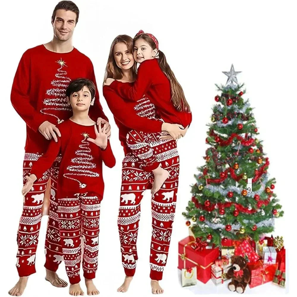 Family wearing matching Christmas pajamas set in winter nightwear